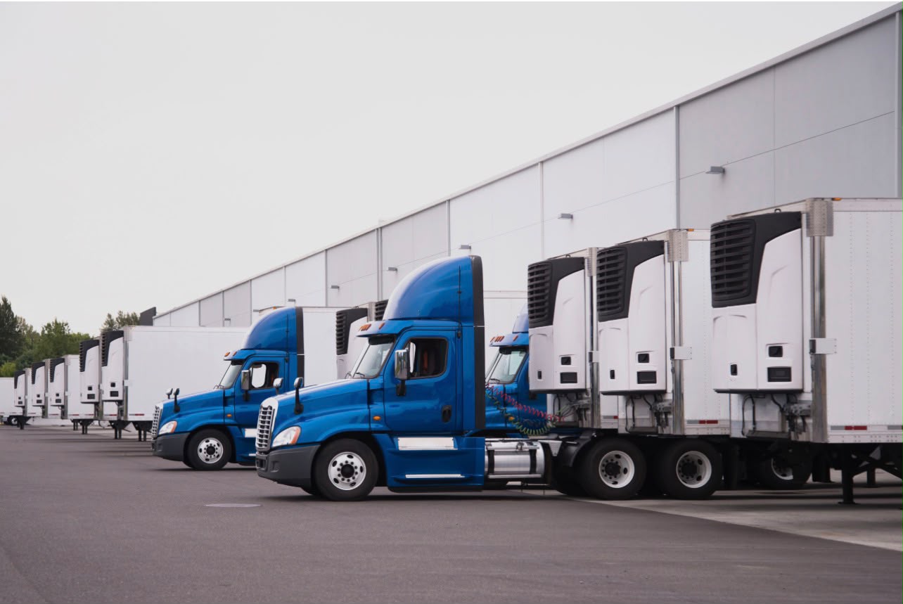 Freight truck parked near a logistics facility